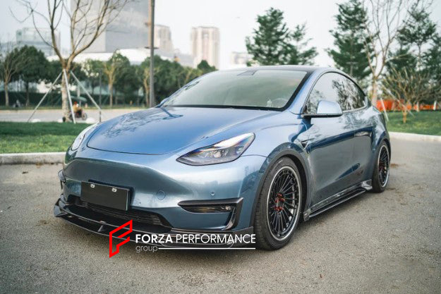 CARBON BODY KIT FOR TESLA MODEL Y 2020+

Set includes:

Front Lip

Front Bumper Canards
Side Skirts
Rear Bumper
Rear Spoiler

Material: Carbon Fiber

Note: Professional installation is required