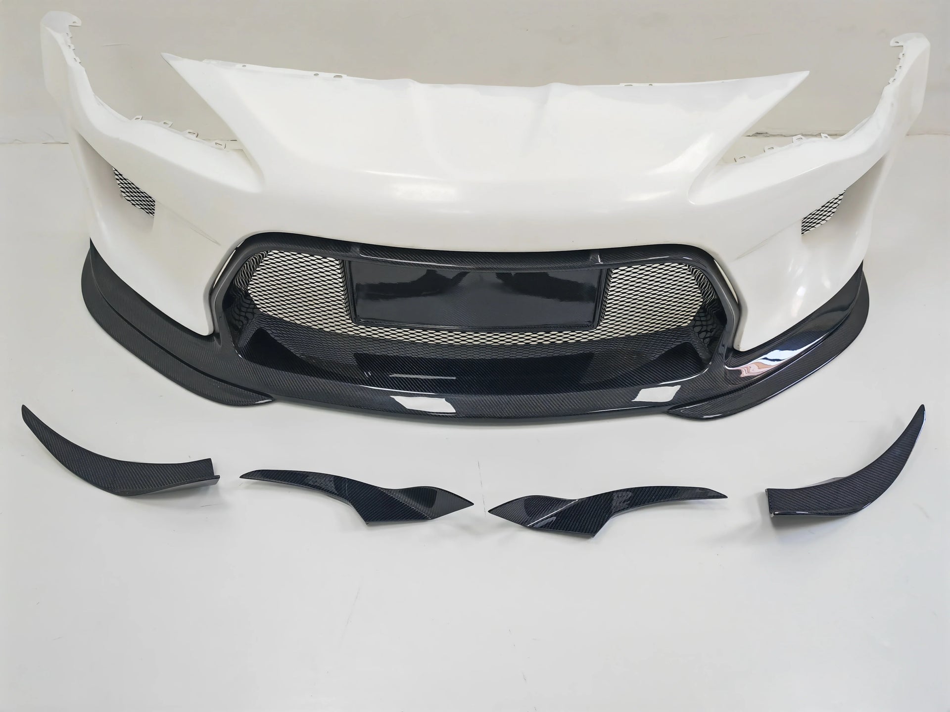 CARBON WIDE BODY KIT for TOYOTA GT86 SUBARU BRZ ZN6 2012 - 2021

Set includes:

Front Lip
Front Bumper Assembly

Front Bumper Canards
Hood / Bonnet
Front Wide Fenders
Side Skirts

Rear Wide Fenders
Rear Wing Spoiler
Rear Spoiler / Ducktail
Rear Bumper
Rear Diffuser

Material:&nbsp;Wet Carbon with Fiberglass

NOTE:&nbsp;Professional installation is required. Fenders cutting is required. Suspension setup should be checked after fitting to avoid contact at full compression.

Recommended Wheels size:

Front:&nb