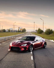 CARBON WIDE BODY KIT for TOYOTA GT86 SUBARU BRZ ZN6 2012 - 2021

Set includes:

Front Lip
Front Bumper Assembly

Front Bumper Canards
Hood / Bonnet
Front Wide Fenders
Side Skirts

Rear Wide Fenders
Rear Wing Spoiler
Rear Spoiler / Ducktail
Rear Bumper
Rear Diffuser

Material:&nbsp;Wet Carbon with Fiberglass

NOTE:&nbsp;Professional installation is required. Fenders cutting is required. Suspension setup should be checked after fitting to avoid contact at full compression.

Recommended Wheels size:

Front:&nb