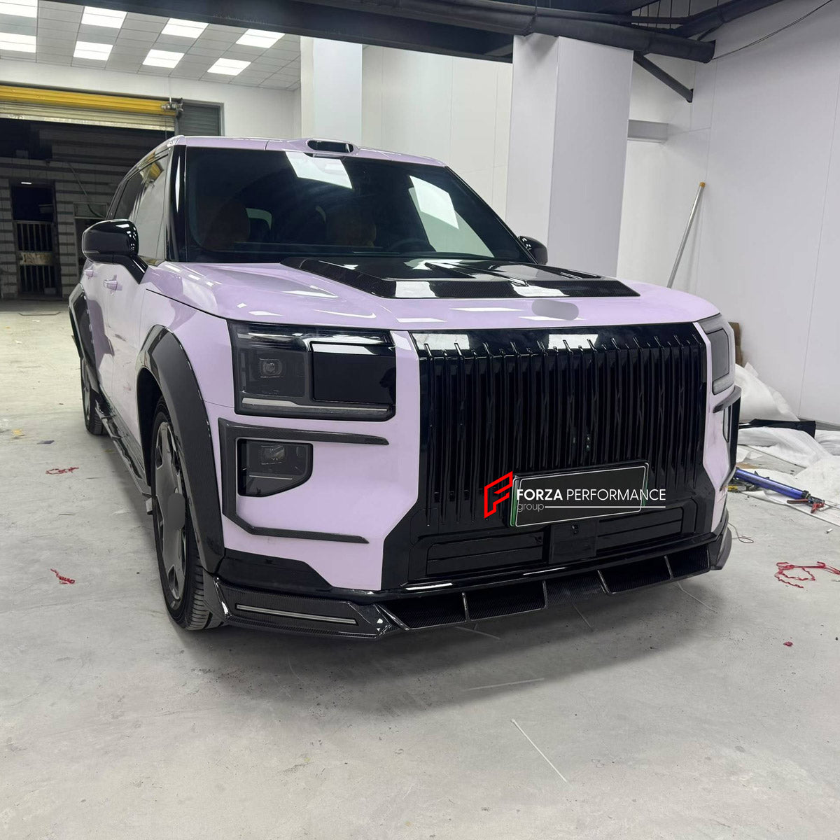 CARBON BODY KIT for ZEEKR 9X 2025+ FORZA PERFORMANCE custom fit RNG Style

Set includes:
Front Lip
Front Bumper Canards
Hood Scoop Trim Cover
Fender Flares
Side Skirts

Material: Carbon

NOTE: Professional installation is required.