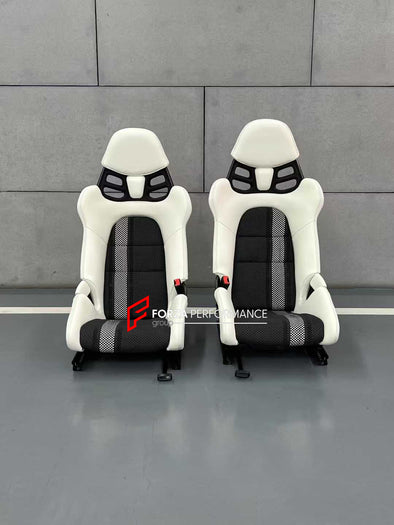 We manufacture custom carbon bucket seats for Porsche models. We offer fully customizable options including an optional memory foam insert, integrated side airbags, electric connectors to seat belts, and a seat occupancy sensor further elevate safety without compromising on a lightweight, durable construction—ensuring you race ahead with unmatched support.

Advantages of Forza Performance Group Bucket Seats:
Fully Customizable Design
Optional Memory Foam Insert

Integrated Side Airbags
Electric Connectors t
