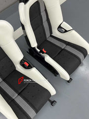 We manufacture custom carbon bucket seats for Porsche models. We offer fully customizable options including an optional memory foam insert, integrated side airbags, electric connectors to seat belts, and a seat occupancy sensor further elevate safety without compromising on a lightweight, durable construction—ensuring you race ahead with unmatched support.

Advantages of Forza Performance Group Bucket Seats:
Fully Customizable Design
Optional Memory Foam Insert

Integrated Side Airbags
Electric Connectors t