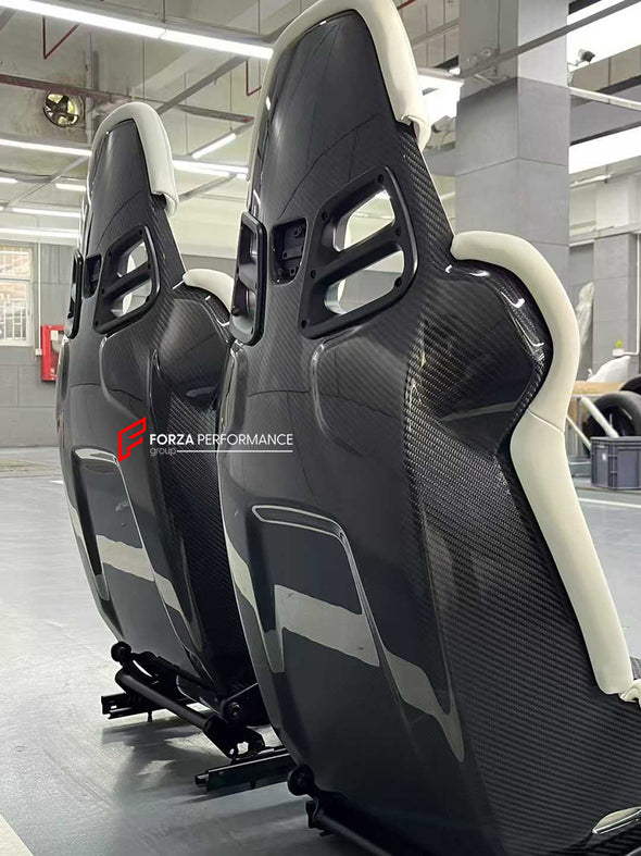 We manufacture custom carbon bucket seats for Porsche models. We offer fully customizable options including an optional memory foam insert, integrated side airbags, electric connectors to seat belts, and a seat occupancy sensor further elevate safety without compromising on a lightweight, durable construction—ensuring you race ahead with unmatched support.

Advantages of Forza Performance Group Bucket Seats:
Fully Customizable Design
Optional Memory Foam Insert

Integrated Side Airbags
Electric Connectors t