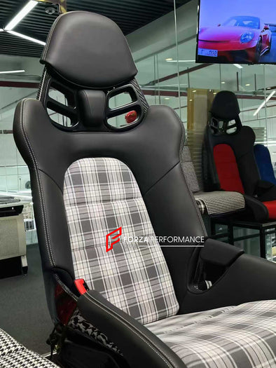We manufacture custom carbon bucket seats for Porsche models. We offer fully customizable options including an optional memory foam insert, integrated side airbags, electric connectors to seat belts, and a seat occupancy sensor further elevate safety without compromising on a lightweight, durable construction—ensuring you race ahead with unmatched support.

Advantages of Forza Performance Group Bucket Seats:
Fully Customizable Design
Optional Memory Foam Insert

Integrated Side Airbags
Electric Connectors t