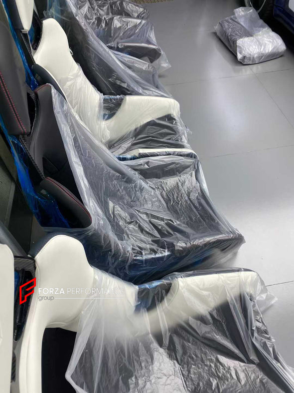 We manufacture custom carbon bucket seats for Porsche models. We offer fully customizable options including an optional memory foam insert, integrated side airbags, electric connectors to seat belts, and a seat occupancy sensor further elevate safety without compromising on a lightweight, durable construction—ensuring you race ahead with unmatched support.

Advantages of Forza Performance Group Bucket Seats:
Fully Customizable Design
Optional Memory Foam Insert

Integrated Side Airbags
Electric Connectors t