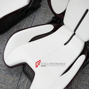 CARBON BUCKET SEATS LWCB for FERRARI 296 GTB

A single seat can be sold, purchasing a pair is not required.

All bucket seats photos on our website are real images of the actual product.

We produce custom carbon bucket seats for every Ferrari models. We offer fully customizable options.

Custom Options:

Cushion Inserts: Custom Design
Finishing Options: Alcantara, Leather, Cloth
Logo Options: Custom Logo by your request
Seats shell material: Dry Carbon

NOTE: Professional installation is required.