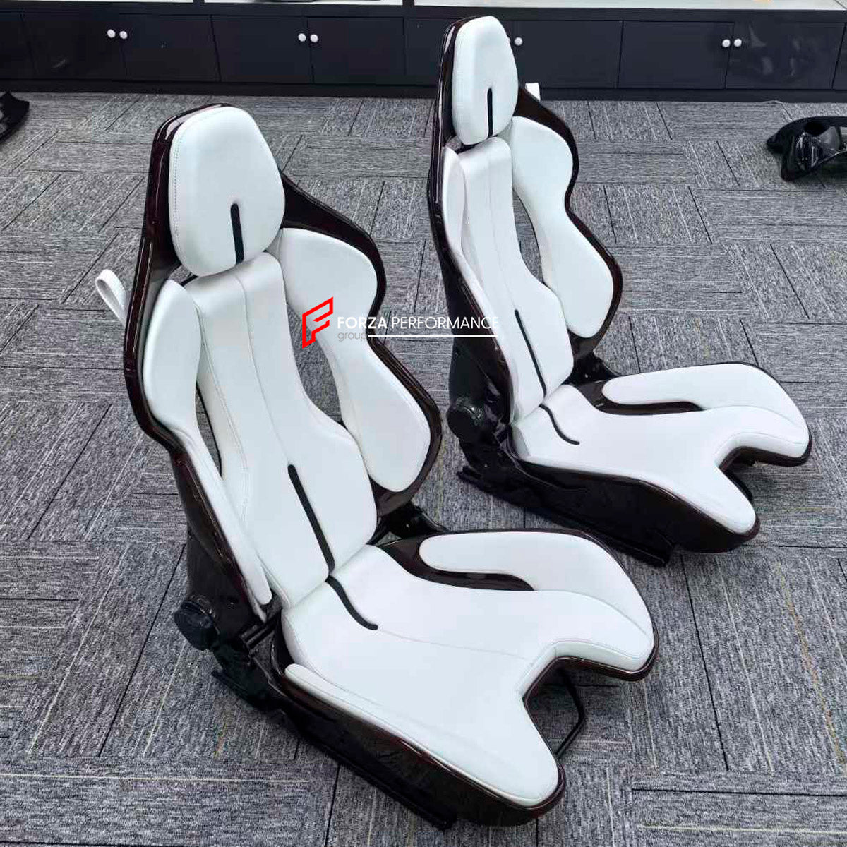 CARBON BUCKET SEATS LWCB for FERRARI 296 GTB

A single seat can be sold, purchasing a pair is not required.

All bucket seats photos on our website are real images of the actual product.

We produce custom carbon bucket seats for every Ferrari models. We offer fully customizable options.

Custom Options:

Cushion Inserts: Custom Design
Finishing Options: Alcantara, Leather, Cloth
Logo Options: Custom Logo by your request
Seats shell material: Dry Carbon

NOTE: Professional installation is required.