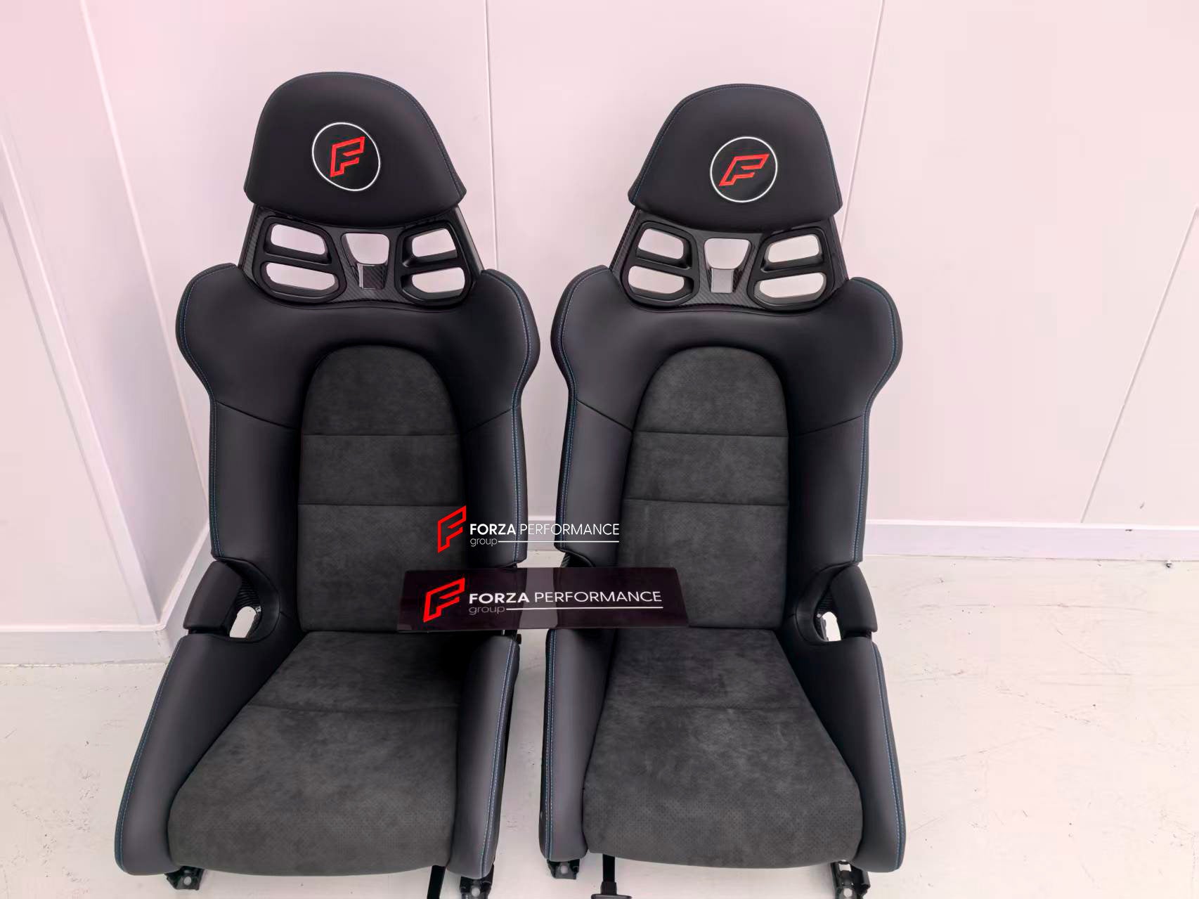 CARBON BUCKET SEATS LWCB for PORSCHE 911 991.2 GT3 2018

We manufacture custom carbon bucket seats for Porsche models. We offer fully customizable options including an optional memory foam insert, integrated side airbags, electric connectors to seat belts, and a seat occupancy sensor further elevate safety without compromising on a lightweight, durable construction—ensuring you race ahead with unmatched support.

Advantages of Forza Performance Group Bucket Seats:
Fully Customizable Design
Optional Memory F