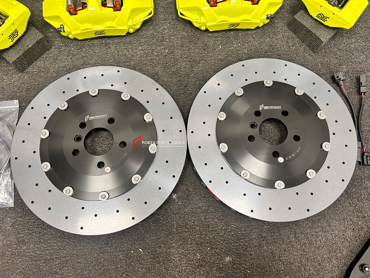 We manufacture premium quality carbon ceramic brakes discs rotors for ROLLS ROYCE CULLINAN SERIES 2 2024+ in any size

Specification:

Authentic Akebono 10 Pot Front Brake Calipers
Authentic Brembo 4 Pot Rear Brake Calipers
Electric Parking Brakes
Front disc: 440 mm, thickness 40 mm

Rear disc: 410 mm, thickness 32 mm
Material: Carbon Ceramic ( C / SiC) rings, Aluminium hat / bell

Includes: Carbon ceramic brake disсs / rotors, brake pads, brackets for calipers, hoses.

Fitment: Direct Bolt-On replace OE IR