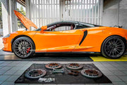 CARBON CERAMIC BIG BRAKE KIT for MCLAREN GT 2019 - 2023

Forza Performance Group offers various types of big brake kits, all types of aftermarket brake calipers, as well as genuine original brands of all types, such as AP Racing, Brembo, Akebono, AMG, M Performance, Audi, Porsche, Lamborghini, Toyota TRD, etc.

Material: Carbon Ceramic

Current set includes:

2x Authentic AP Racing CP9570 6 Pot Front Brake Calipers

2x Authentic AP Racing CP9582 4 pot Rear Brake Calipers
2x Front Brake Discs 380 mm
2x Rear 