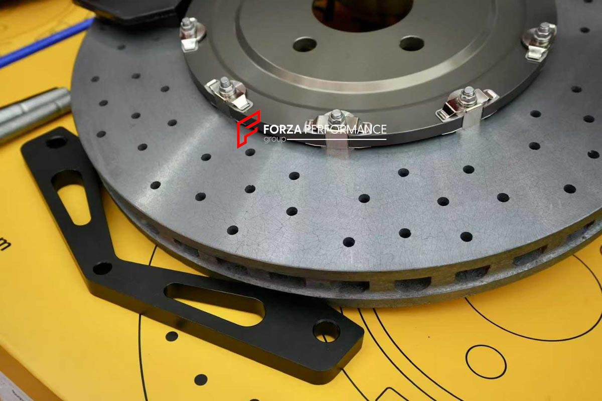 CARBON CERAMIC BIG BRAKE KIT for NISSAN GTR R35

Forza Performance Group offers various types of big brake kits, all types of aftermarket brake calipers, as well as genuine original brands of all types, such as AP Racing, Brembo, Akebono, AMG, M Performance, Audi, Porsche, Lamborghini, Toyota TRD, etc.

Material: Carbon Ceramic

Current set includes:

2x Authentic Brembo 6 Pot Front Brake Calipers

2x Authentic Brembo 4 pot Rear Brake Calipers
2x Electronic Parking Brakes
2x Front Brake Discs 410 mm
2x Rear