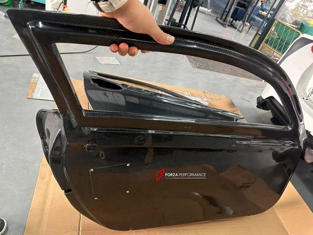 CARBON Doors for Porsche 718 982 Boxster Cayman 2016 - 2025
Set includes:

Doors
Material: Carbon

NOTE: Professional installation is required.