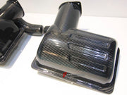 Carbon Engine Air Intake Cover for Ferrari F430
Set includes:

Engine Air Intake Cover
Material: Carbon

NOTE: Professional installation is required.
