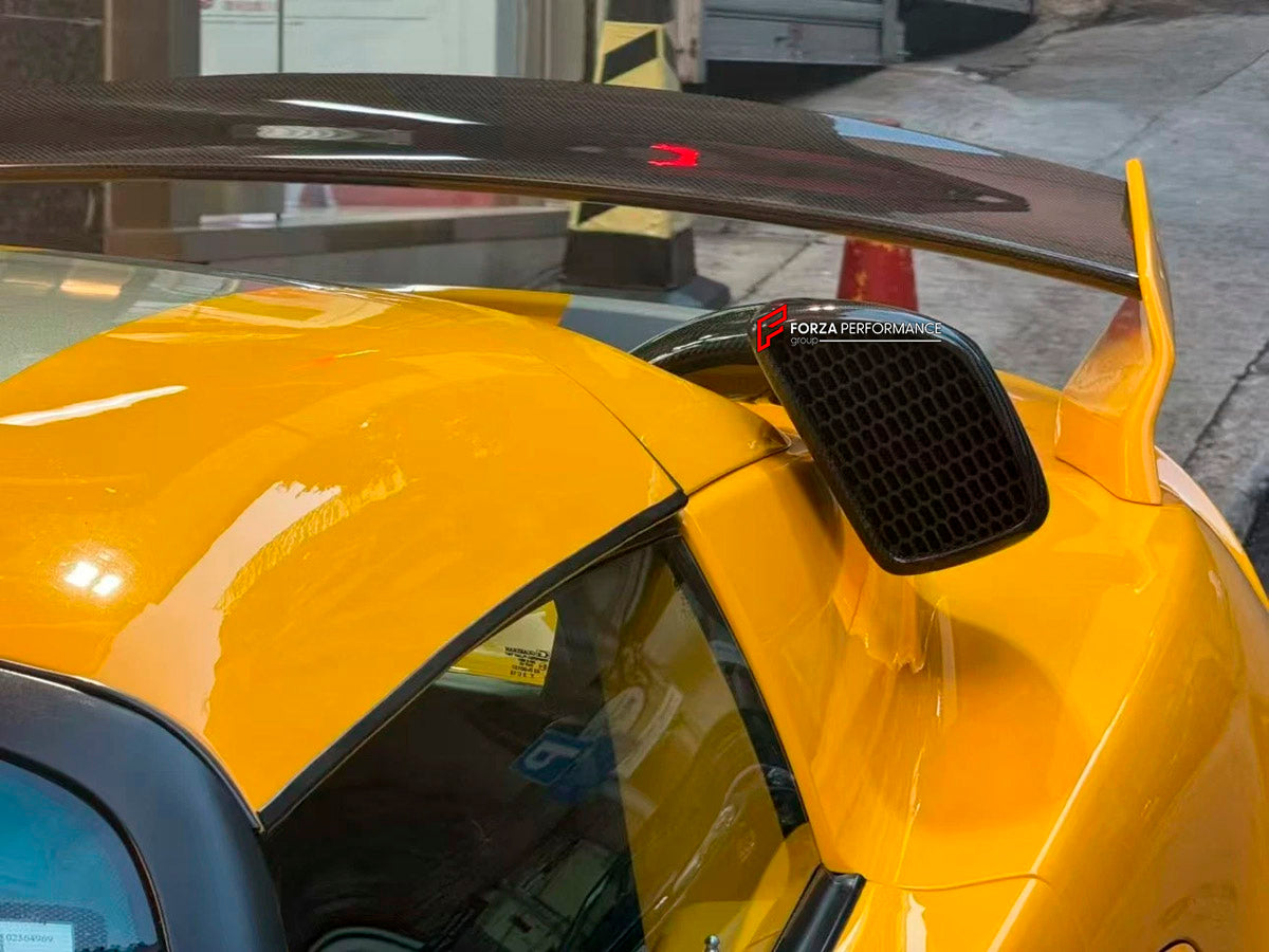 CARBON ENGINE COVER AIR SCOOP for Lotus Elise S2 2002 - 2009
Set includes:

Engine Cover Air Scoop
Material: Carbon

NOTE: Professional installation is required.