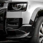 CARBON FIBER FRONT BUMPER CORNER COVERS for LAND ROVER DEFENDER 90 110 130 L663 2020+
Set includes:

Front Bumper Corner Covers
Material: Carbon Fiber

NOTE: Professional installation is required.