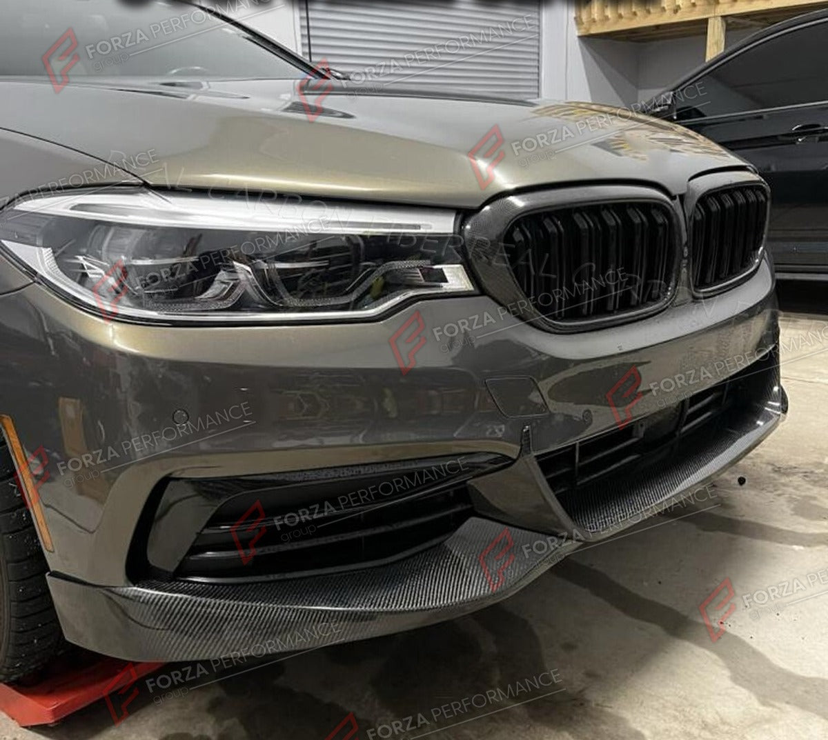 CARBON FIBER FRONT LIP for BMW 5 SERIES G30 520I 530I 540I 550I BASE SEDAN 2017 - 2019 FORZA PERFORMANCE Custom Fit
Set includes:

Front Lip
Material: Carbon Fiber

NOTE: Professional installation is required.

Why “Contact Us for Pricing”?
We don’t display fixed prices because our goal is to offer you the most competitive deal possible. Product costs often decrease over time, and by requesting a quote, you’ll receive our most up-to-date price on market.

SECURED PAYMENT METHODS
PayPal (+4.4% fee)
Visa / Ma
