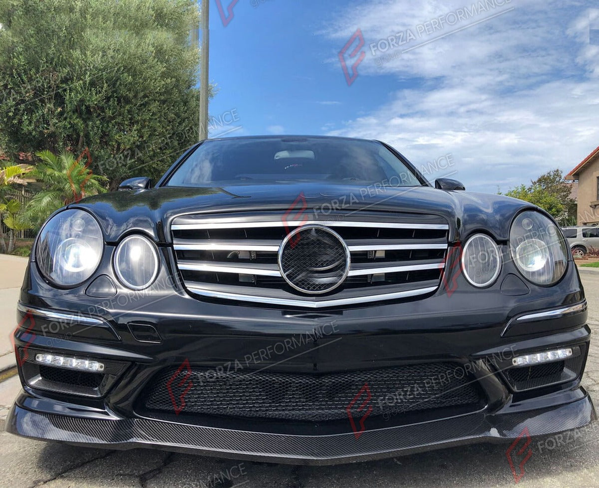 CARBON FIBER FRONT LIP for MERCEDES BENZ E CLASS W211 E63 2006 - 2009 FORZA PERFORMANCE Custom Fit
Set includes:

Front Lip
Material: Carbon Fiber

NOTE: Professional installation is required.

Why “Contact Us for Pricing”?
We don’t display fixed prices because our goal is to offer you the most competitive deal possible. Product costs often decrease over time, and by requesting a quote, you’ll receive our most up-to-date price on market.

SECURED PAYMENT METHODS
PayPal (+4.4% fee)
Visa / Mastercard / Americ