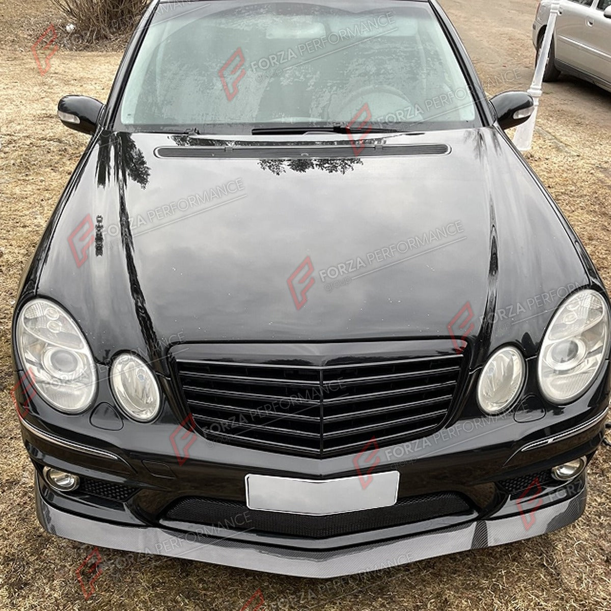 CARBON FIBER FRONT LIP for MERCEDES BENZ E CLASS W211 E63 2006 - 2009 FORZA PERFORMANCE Custom Fit
Set includes:

Front Lip
Material: Carbon Fiber

NOTE: Professional installation is required.

Why “Contact Us for Pricing”?
We don’t display fixed prices because our goal is to offer you the most competitive deal possible. Product costs often decrease over time, and by requesting a quote, you’ll receive our most up-to-date price on market.

SECURED PAYMENT METHODS
PayPal (+4.4% fee)
Visa / Mastercard / Americ