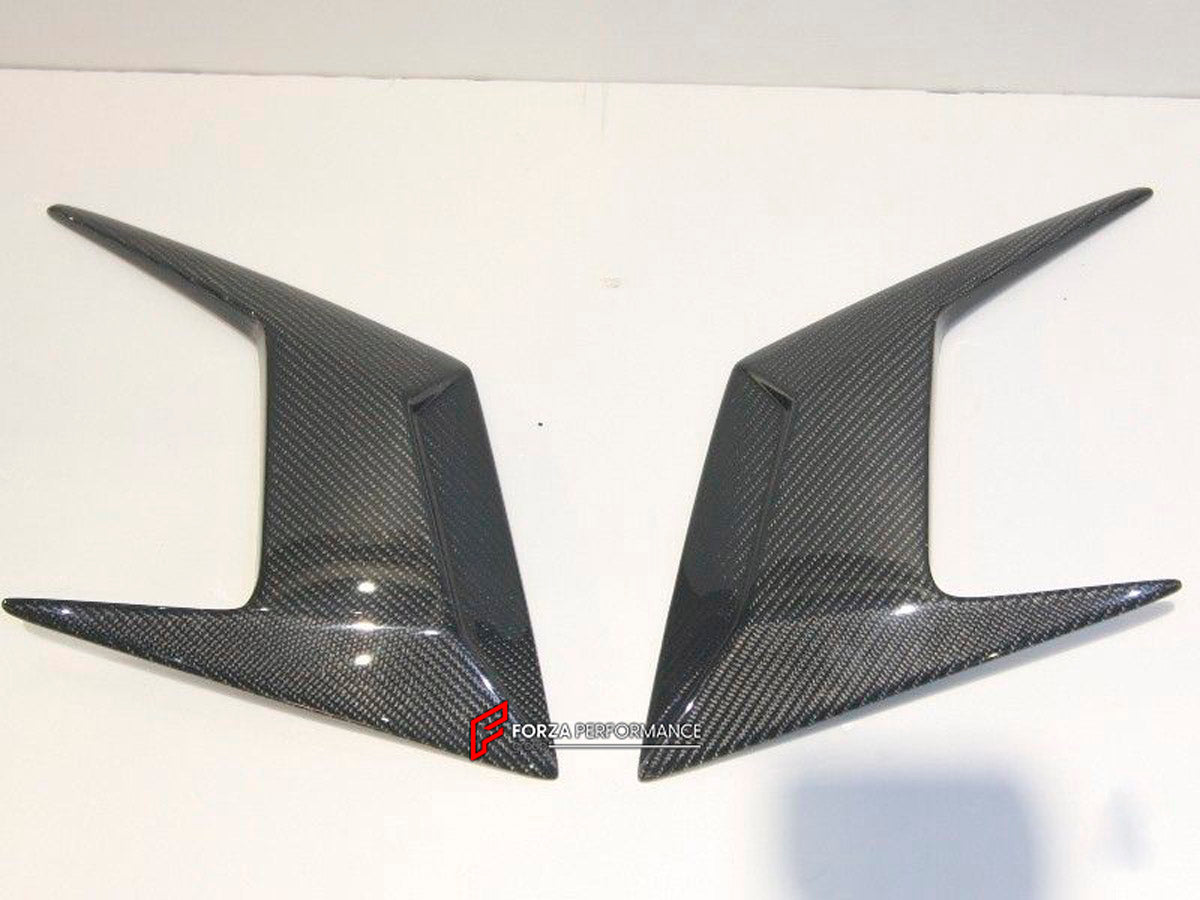 Carbon Front Canard Air Diffuser for Lamborghini Aventador LP700
Set includes:

Front Canard Air Diffuser Fit
Material: Carbon

NOTE: Professional installation is required.
