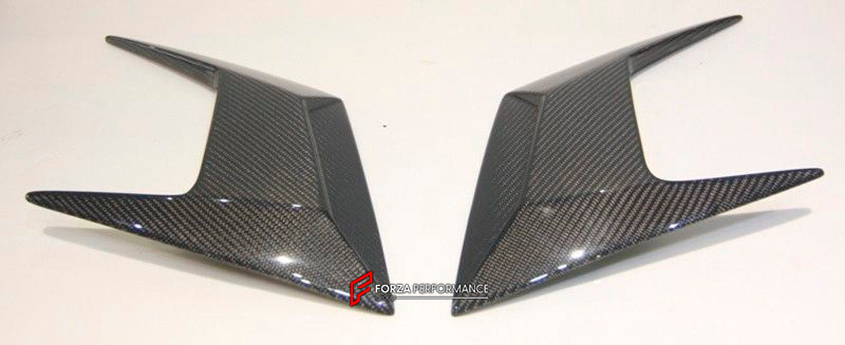 Carbon Front Canard Air Diffuser for Lamborghini Aventador LP700
Set includes:

Front Canard Air Diffuser Fit
Material: Carbon

NOTE: Professional installation is required.