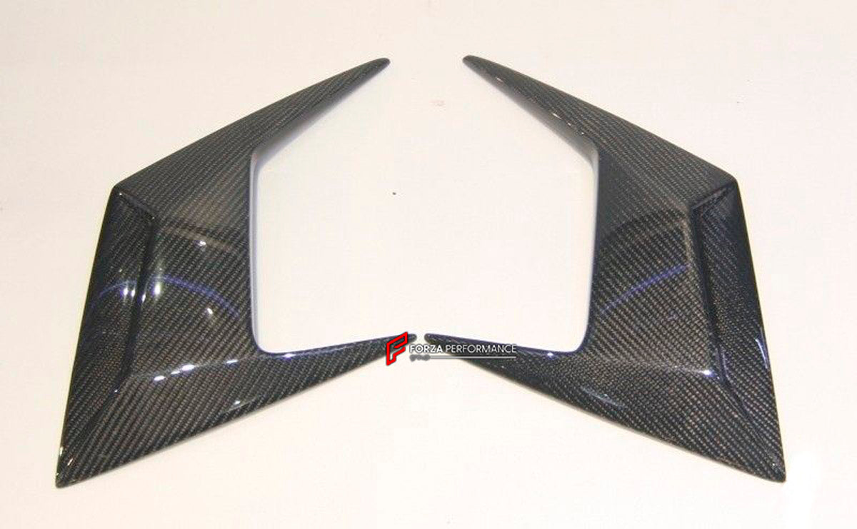 Carbon Front Canard Air Diffuser for Lamborghini Aventador LP700
Set includes:

Front Canard Air Diffuser Fit
Material: Carbon

NOTE: Professional installation is required.