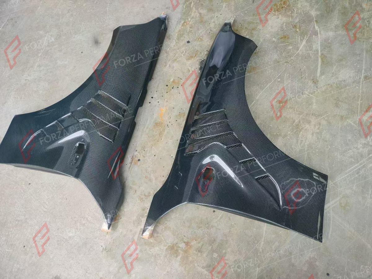 CARBON FRONT FENDERS for BMW M2 M2C F87 2016 - 2021 FORZA PERFORMANCE custom fit Alpha-n Style

Set includes:
Front Fenders

Material: Carbon

NOTE: Professional installation is required.