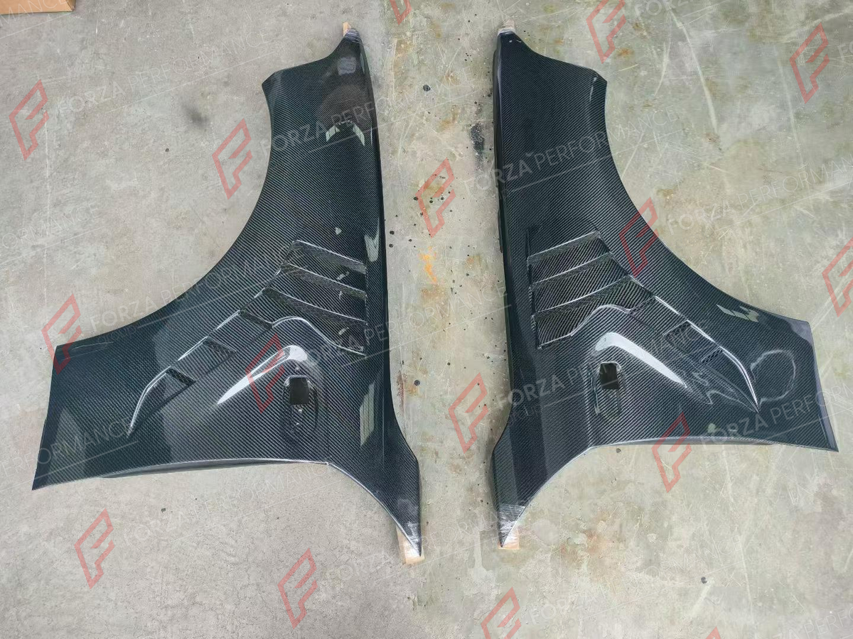 CARBON FRONT FENDERS for BMW M2 M2C F87 2016 - 2021 FORZA PERFORMANCE custom fit Alpha-n Style

Set includes:
Front Fenders

Material: Carbon

NOTE: Professional installation is required.