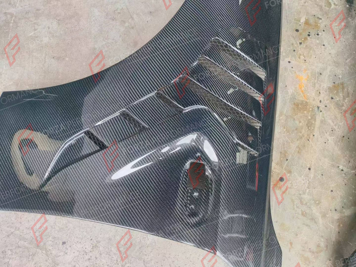 CARBON FRONT FENDERS for BMW M2 M2C F87 2016 - 2021 FORZA PERFORMANCE custom fit Alpha-n Style

Set includes:
Front Fenders

Material: Carbon

NOTE: Professional installation is required.