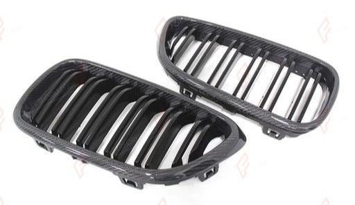 CARBON FRONT GRILLE DUAL SLATS for BMW X3M F97 X4M F98 PRE LCI 2019 - 2021
Set includes:

Front Grille
Material: Carbon

NOTE: Professional installation is required.