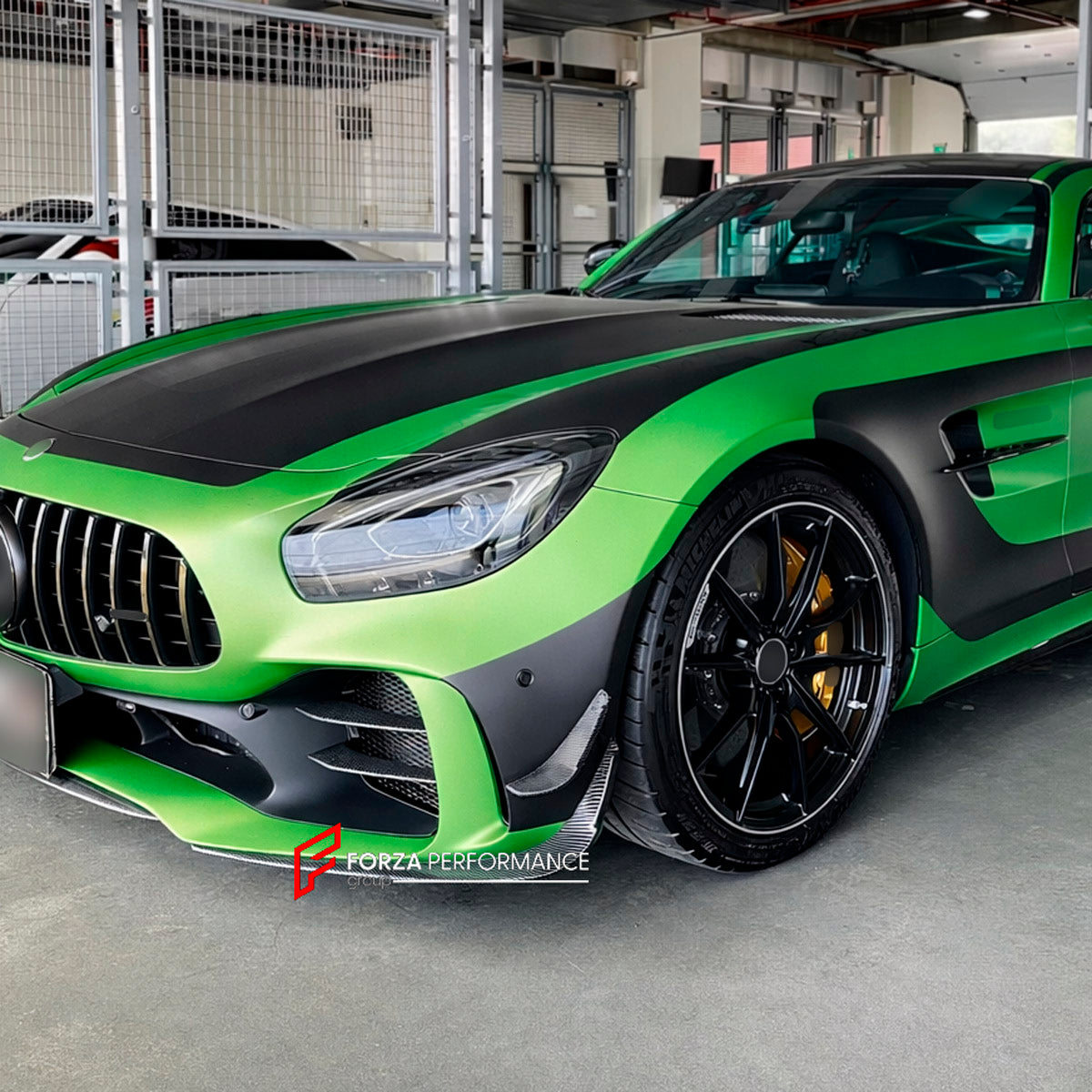 CARBON Front Lip with Front Bumper Canards for Mercedes Benz AMG GTR 2017 - 2021
Set includes:

Front Lip
Front Bumper Canards
Material: Carbon

NOTE: Professional installation is required.