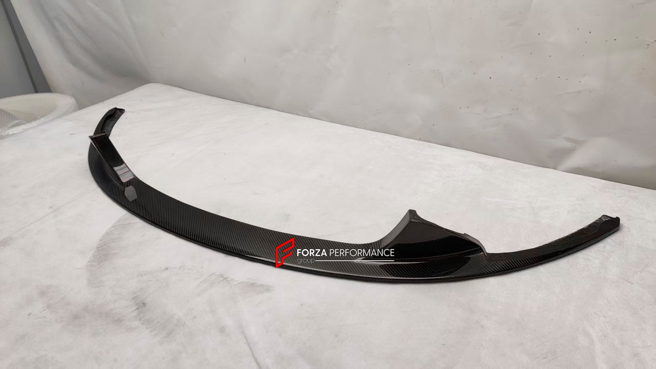 CARBON FRONT LIP for ASTON MARTIN VANTAGE V8 V12 2005 - 2017

Set includes:

Front Lip

Material: Carbon Fiber

Note: Professional installation is required
