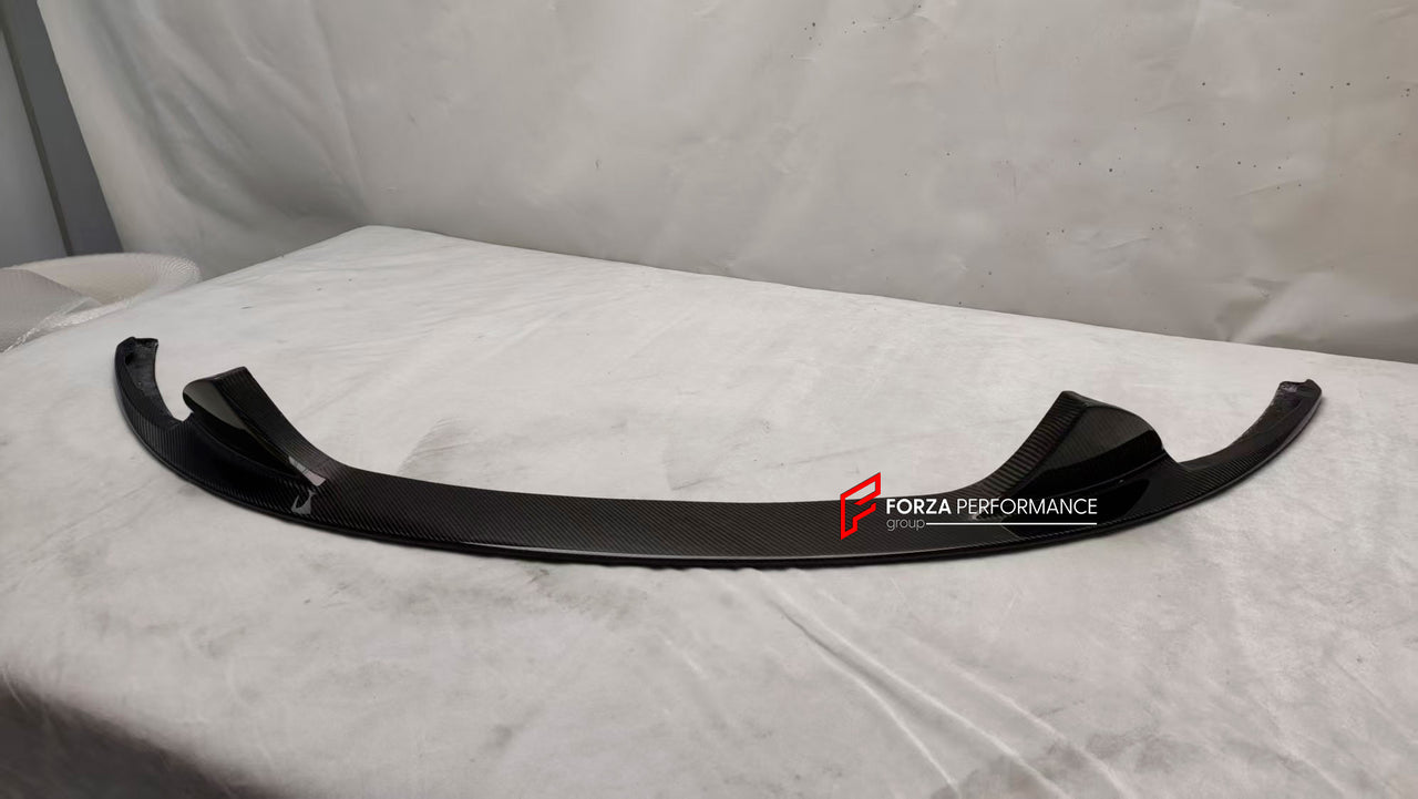 CARBON FRONT LIP for ASTON MARTIN VANTAGE V8 V12 2005 - 2017

Set includes:

Front Lip

Material: Carbon Fiber

Note: Professional installation is required
