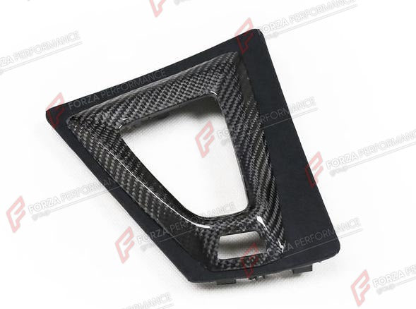 CARBON GEAR SURROUND COVER for BMW M3 F80 2015 - 2020
Set includes:

Gear Surround Cover
Material: Carbon + Alcantara

NOTE: Available for LHD and RHD cars - specify your drive side. Professional installation is required.