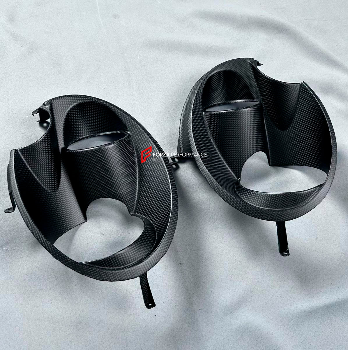 CARBON HEADLIGHT COVERS for PORSCHE 911 992 2019+ Forza Performance Custom fit
Set includes:

Headlight Covers
Material: Carbon

NOTE: Professional installation is required.