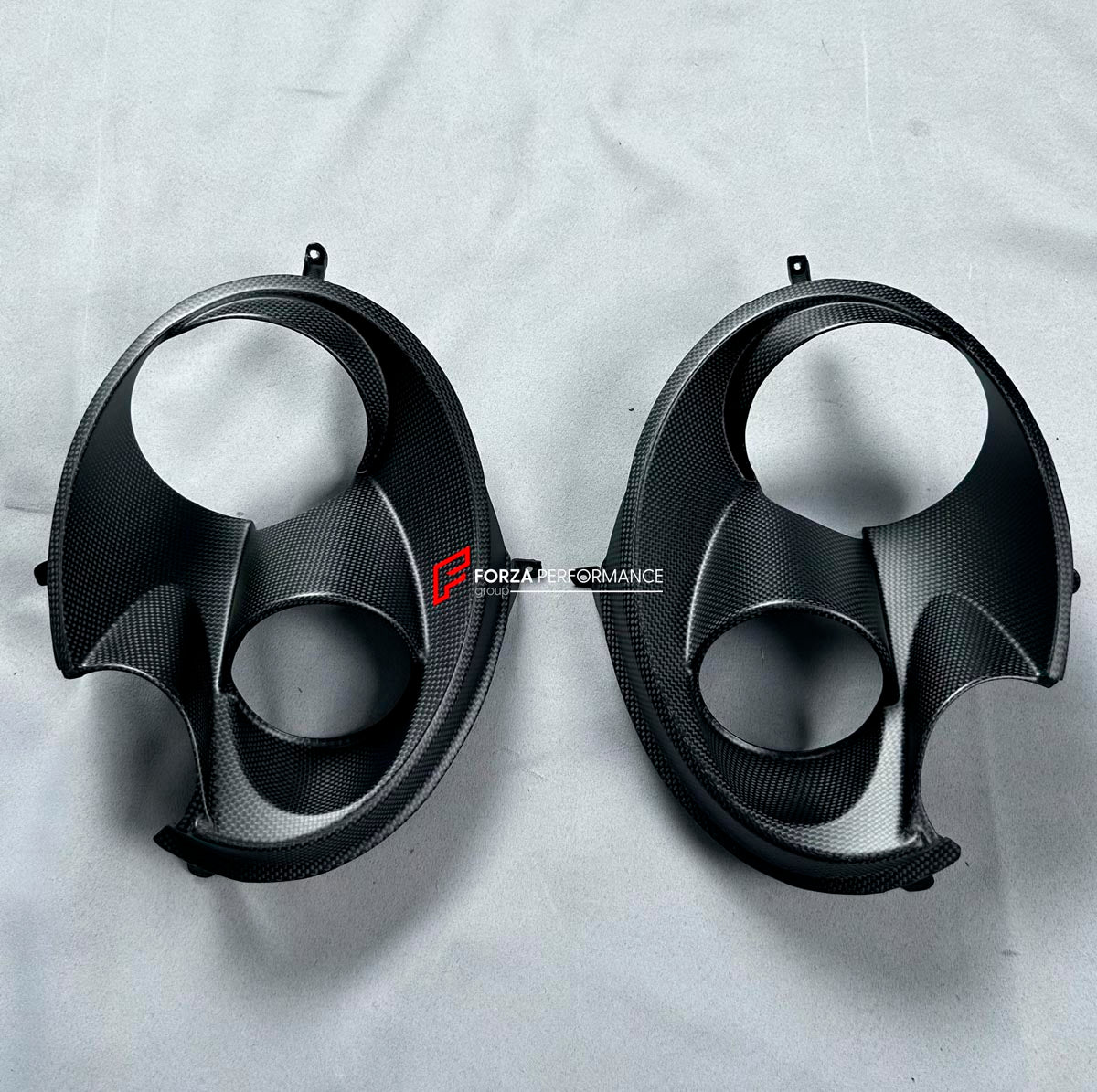 CARBON HEADLIGHT COVERS for PORSCHE 911 992 2019+ Forza Performance Custom fit
Set includes:

Headlight Covers
Material: Carbon

NOTE: Professional installation is required.