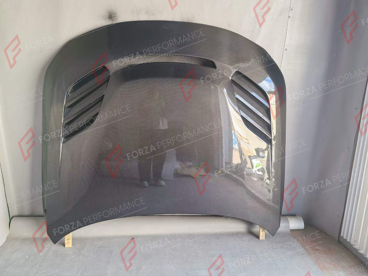 CARBON HOOD BONNET for BMW 2 SERIES G42 M2 G87 2021+ FORZA PERFORMANCE custom fit Alpha-N Style

Set includes:
Hood Bonnet

Material: Carbon

NOTE: Professional installation is required.