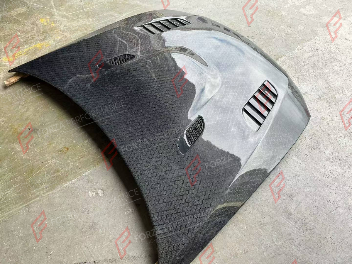 CARBON HOOD BONNET for BMW 3 SERIES E92 2005 - 2010 FORZA PERFORMANCE custom fit V Style

Set includes:
Hood Bonnet

Material: Carbon

NOTE: Professional installation is required.