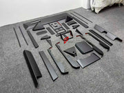CARBON INTERIOR KIT for TESLA CYBERTRUCK 2023+

Set includes:

Dashboard Trim
Central Console Trim
Door Sills
Door Trims

Material: Carbon

NOTE: Professional installation is required.