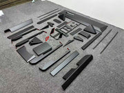 CARBON INTERIOR KIT for TESLA CYBERTRUCK 2023+

Set includes:

Dashboard Trim
Central Console Trim
Door Sills
Door Trims

Material: Carbon

NOTE: Professional installation is required.