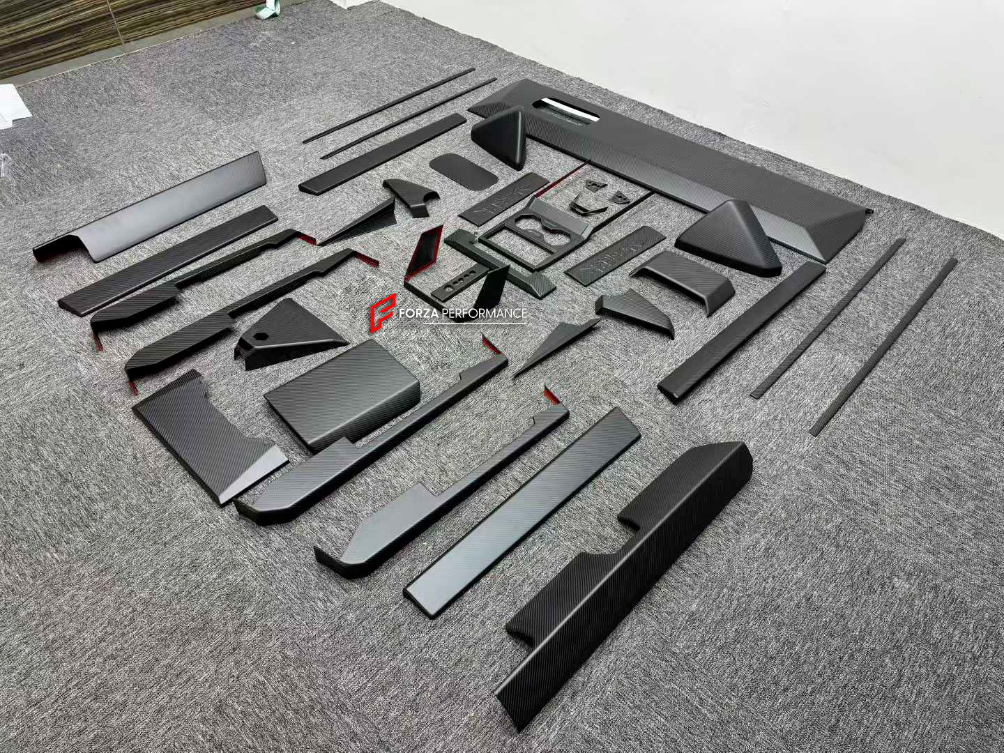 CARBON INTERIOR KIT for TESLA CYBERTRUCK 2023+

Set includes:

Dashboard Trim
Central Console Trim
Door Sills
Door Trims

Material: Carbon

NOTE: Professional installation is required.