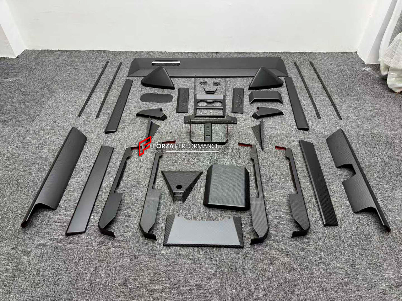 CARBON INTERIOR KIT for TESLA CYBERTRUCK 2023+

Set includes:

Dashboard Trim
Central Console Trim
Door Sills
Door Trims

Material: Carbon

NOTE: Professional installation is required.