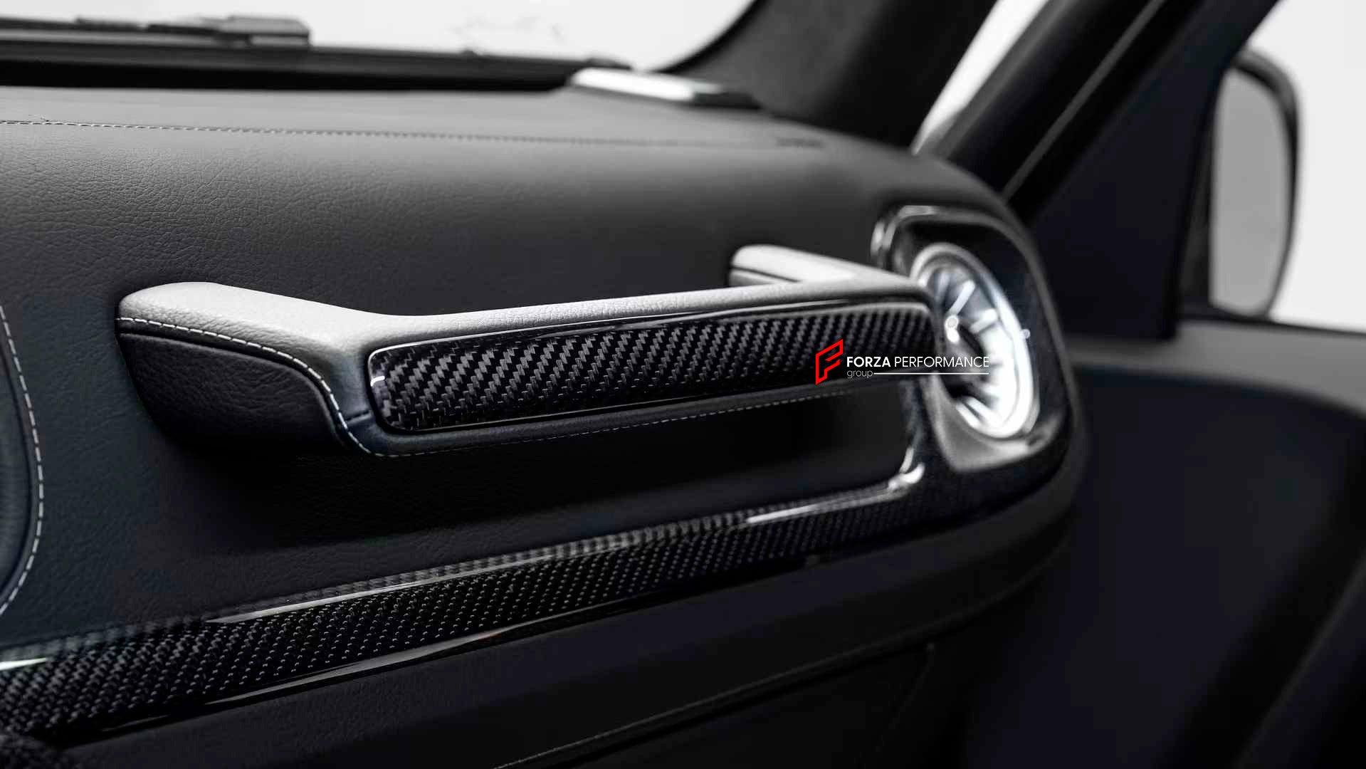 CARBON INTERIOR TRIM KIT for MERCEDES-BENZ G-CLASS G63 W465 2024+

Set includes:

Dashboard Trims
Center Console Trims

Material: Carbon Fiber

NOTE: Professional installation is required.