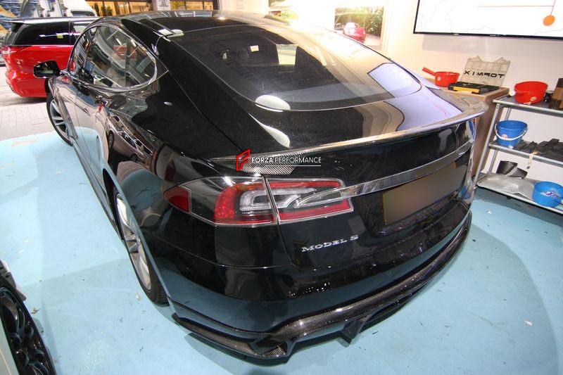CARBON LIP SPOILER for TESLA MODEL S
Set includes:

Lip Spoiler
Material: Carbon

NOTE: Professional installtion is required.