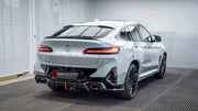 CARBON REAR DIFFUSER AND REAR BUMPER FINS for BMW X4 G02 LCI 2021+

Set includes:
Rear Bumper Fins
Rear Diffuser

Material: Carbon

NOTE: Professional installation is required.