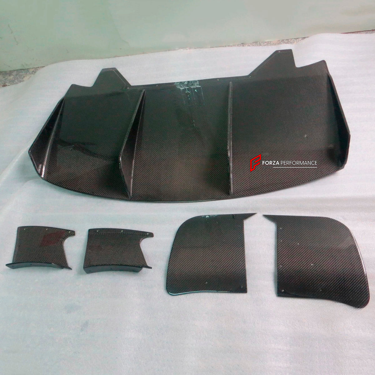 Carbon Rear Diffuser for Lotus Evora S GT4 GTE GTX 2009 - 2021
Set includes:

Rear Diffuser
Material: Carbon

NOTE: Professional installation is required.