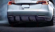 CARBON REAR DIFFUSER for TESLA MODEL 3 2017 - 2023 V Style
Set includes:

Rear Diffuser
Material: Carbon + FRP

NOTE: Add-on type - installs over the original part. Professional installation is required.