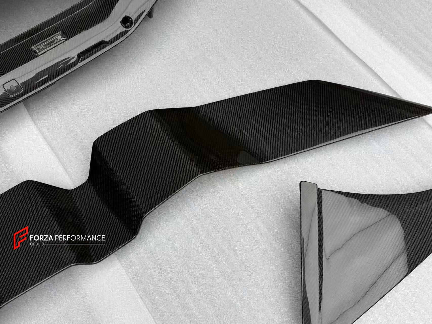 CARBON FRONT LIP for LAMBORGHINI REVUELTO 2023+

Set includes:

Front Lip Splitter
Front Bumper Canards
Side Mirror Covers
Fender Trims
Side Skirts
Air Vents Trims
Rear Engine Bay Cover
Rear Wing Spoiler
Rear Bumper Canards
Rear Diffuser

Material: Carbon

NOTE: Professional installation is required.