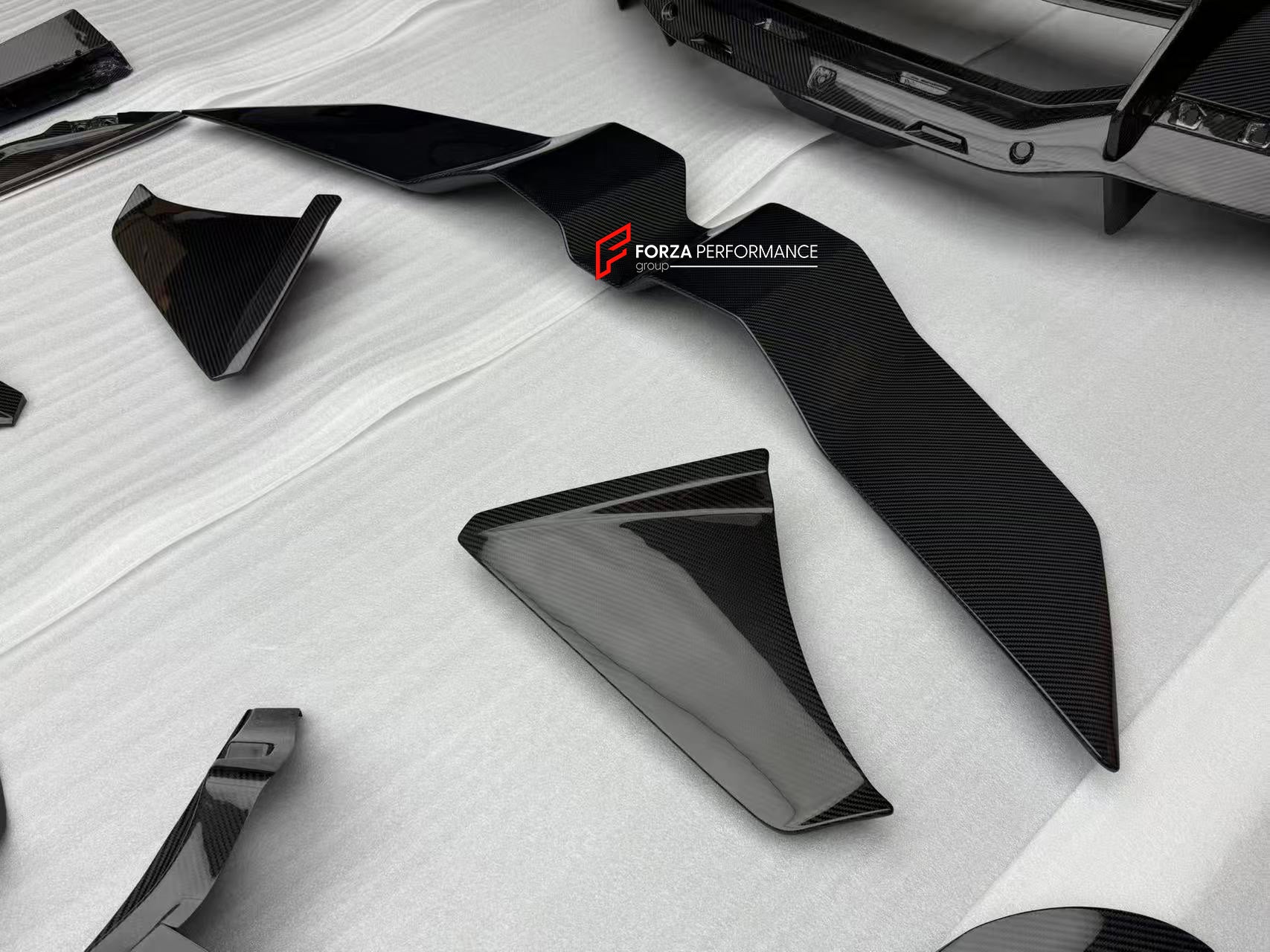 CARBON FRONT LIP for LAMBORGHINI REVUELTO 2023+

Set includes:

Front Lip Splitter
Front Bumper Canards
Side Mirror Covers
Fender Trims
Side Skirts
Air Vents Trims
Rear Engine Bay Cover
Rear Wing Spoiler
Rear Bumper Canards
Rear Diffuser

Material: Carbon

NOTE: Professional installation is required.