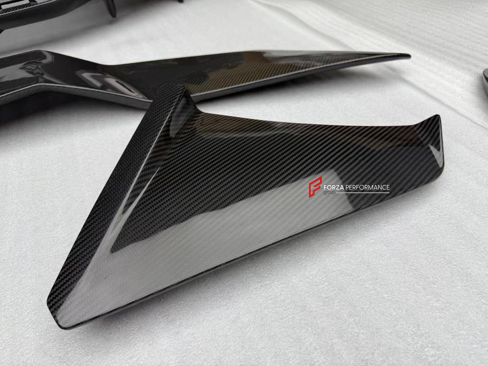 CARBON FRONT LIP for LAMBORGHINI REVUELTO 2023+

Set includes:

Front Lip Splitter
Front Bumper Canards
Side Mirror Covers
Fender Trims
Side Skirts
Air Vents Trims
Rear Engine Bay Cover
Rear Wing Spoiler
Rear Bumper Canards
Rear Diffuser

Material: Carbon

NOTE: Professional installation is required.