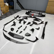 CARBON FRONT LIP for LAMBORGHINI REVUELTO 2023+

Set includes:

Front Lip Splitter
Front Bumper Canards
Side Mirror Covers
Fender Trims
Side Skirts
Air Vents Trims
Rear Engine Bay Cover
Rear Wing Spoiler
Rear Bumper Canards
Rear Diffuser

Material: Carbon

NOTE: Professional installation is required.